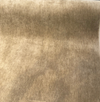Fabricut mohair velvet in Brown Sugar camel tan on the bolt showing the selvage