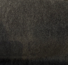 Fabricut mohair velvet in Obsidian Black draped in a swirl on the cutting table