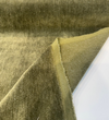 Fabricut mohair velvet in Green Commander olive with the olive-gold backing folded back