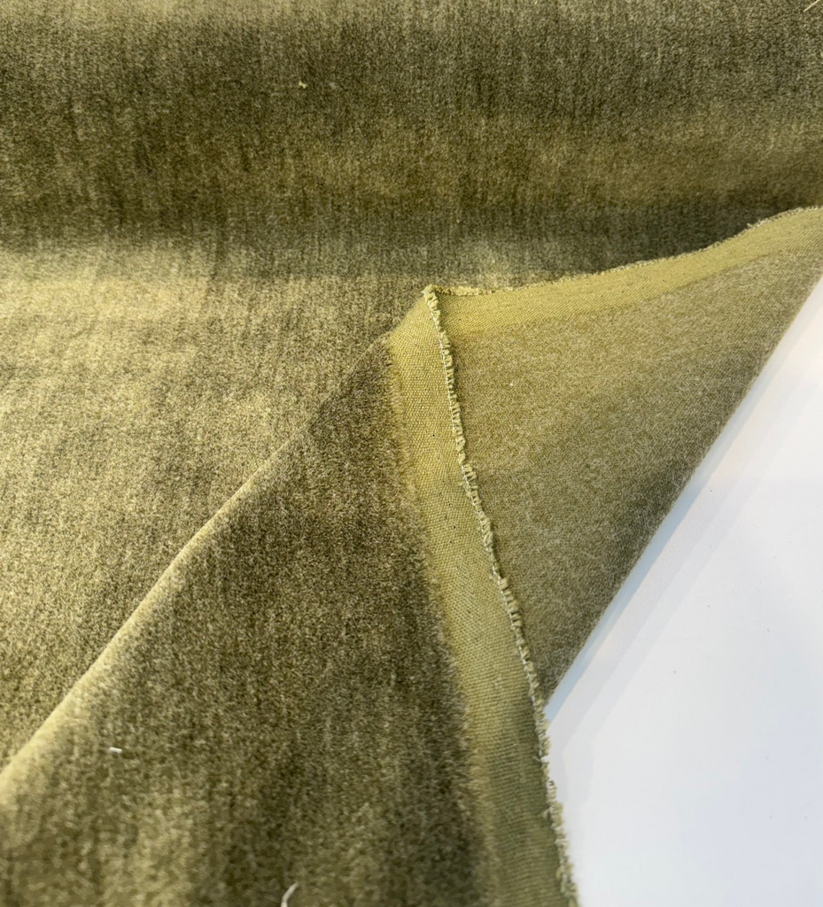Fabricut mohair velvet in Green Commander olive with the olive-gold backing folded back