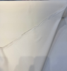 Crypton Sintra Cream velvet with the selvage folded back showing the satiny sheen