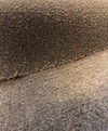 Warm brown textured bouclé upholstery fabric for sofas and accent chairs