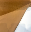 Caramel cognac Crypton velvet upholstery fabric laid flat showing the soft pile