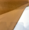 Caramel cognac Crypton velvet upholstery fabric laid flat showing the soft pile