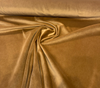 Close-up of Crypton Sintra Rattan velvet pile showing butterscotch and amber sheen