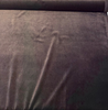 Crypton Sintra Mink brown performance velvet on the roll across the cutting table