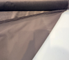 Deep mink brown Crypton velvet upholstery fabric showing the taupe sheen