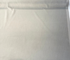 Crypton Sintra Stone gray performance velvet on the roll across the cutting table