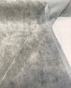 Close view of Fabricut Mineral Gray mohair velvet with its soft mottled sheen