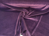 Crypton Sintra Eggplant velvet draped in a swirl to show the plum sheen