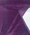 Deep aubergine Crypton velvet upholstery fabric with the selvage edge showing