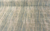 Mirage Greenery green strié mohair velvet on the roll, shown lighter than in person