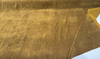 Golden ochre mohair velvet fabric by the yard showing its mottled sheen