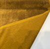 Close-up of Cognac gold mohair velvet showing the plush heathered pile