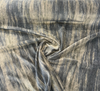 Mirage Galaxy blue gray mohair velvet rolled back to show the light gray backing