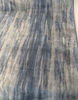 Slate blue and greige strié mohair velvet shown along the selvage