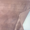 Sintra Raisin dusty mauve velvet on the roll, folded back to show the backing