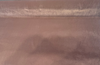 Close-up of Crypton Sintra Raisin velvet pile with its satiny luster