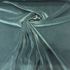 Crypton Sintra Tourmaline teal performance velvet draped in a swirl to show the sheen