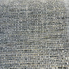 Close-up of the nubby charcoal, gray, sand and white tweed weave of Crypton Rushdie Grey