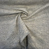 Crypton Rushdie Grey tweed chenille upholstery fabric draped in a swirl