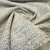 Soft drape of blue, teal, navy and ochre flecked Crypton Rushdie tweed chenille