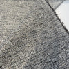 Folded corner of salt-and-pepper Crypton Rushdie Charcoal tweed chenille