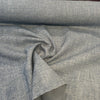 Crypton Wiley Oxford Blue performance upholstery fabric draped in a swirl