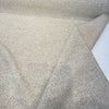 Folded corner of oatmeal Crypton Home Naima Flax performance tweed