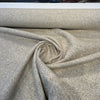 Crypton Home Naima Flax tweed upholstery fabric draped in a swirl