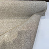 Crypton Naima Flax folded back to show the selvage edge and backing