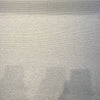 Crypton Kenzo White Pepper ribbed chenille upholstery fabric laid flat on the roll