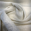 Close swirl of the chunky ivory basketweave on Valdese Inside Out Holiday Alabaster