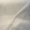 Valdese Holiday Sand Twine folded back to show the cut edge and backing