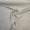 Valdese Holiday Stone Taupe heathered gray basketweave fabric draped in a swirl