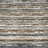 Swavelle Desert Stone Sienna striped chenille upholstery fabric laid flat on the roll