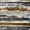 Close-up of the raised chenille texture of Swavelle Desert Stone Sienna