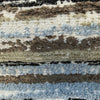 Close-up of the raised blue, brown and black chenille texture of Swavelle Desert Storm Blue