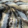 Close swirl of the plush blue and sage chenille stripes on Swavelle Desert Storm