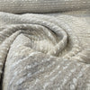 Fabricut Casio Porcelain beige boucle swirled to show drape