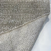 Fabricut Casio Putty boucle folded back to show the reverse side