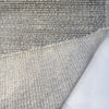 Fabricut Casio Dove boucle folded back to show the reverse side