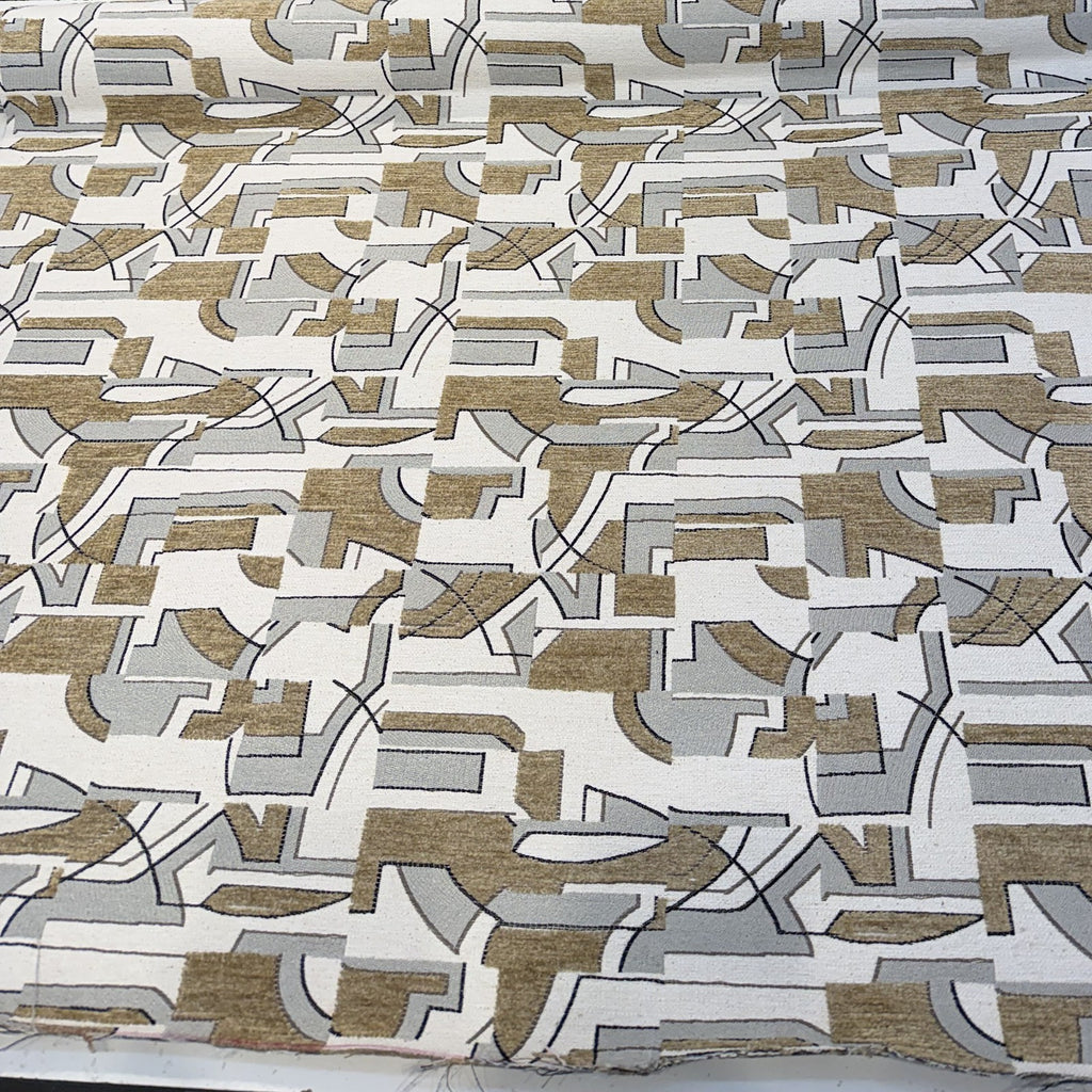 Spicer Fawn geometric chenille upholstery fabric laid flat on the roll