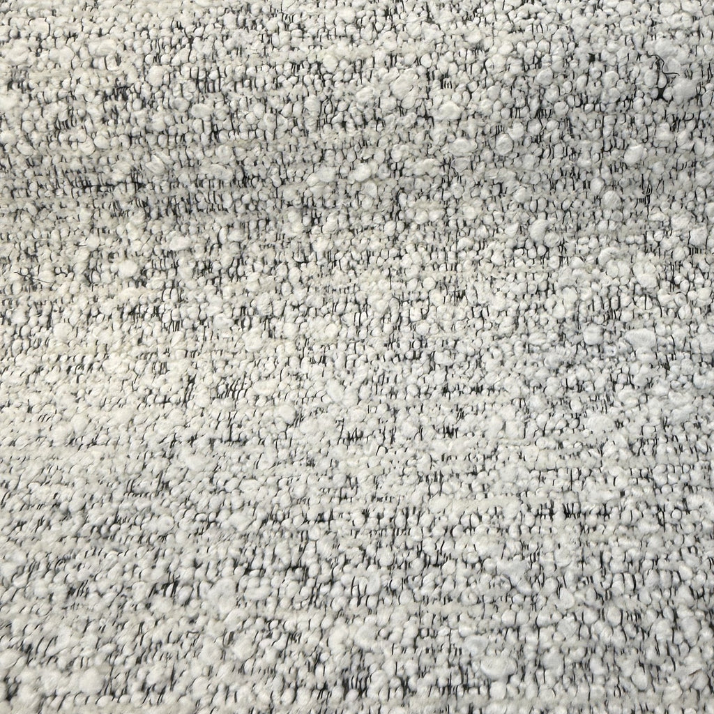 Close-up of Balido White Night chunky boucle loops with black fleck