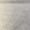 Balido White Night designer boucle upholstery fabric laid flat on the roll