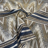 Valdese Taos Clay blue and tan ethnic stripe fabric swirled to show drape