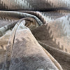 Fabricut Monza Sage green and taupe velvet swirled to show drape