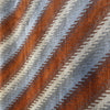 Fabricut Monza Spice rust, blue, gray and cream diagonal stripes on the roll
