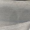 Crypton Dawson Grey chenille folded back to show the selvage and reverse side