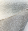 Gorky Snow boucle folded back to show the pale greige reverse
